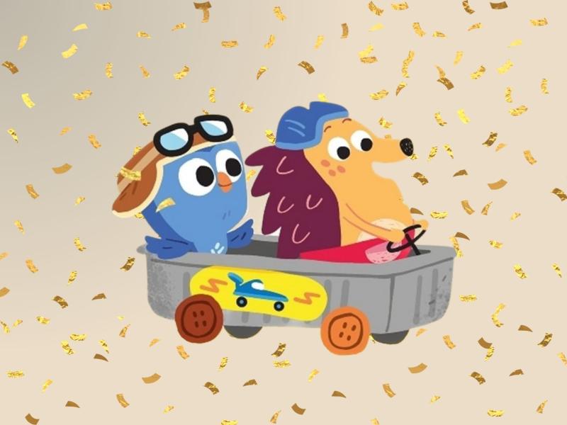 To animerede figurer - hvor den ene er Børste - sidder i en lille legetøjsbil med konfetti i baggrunden.