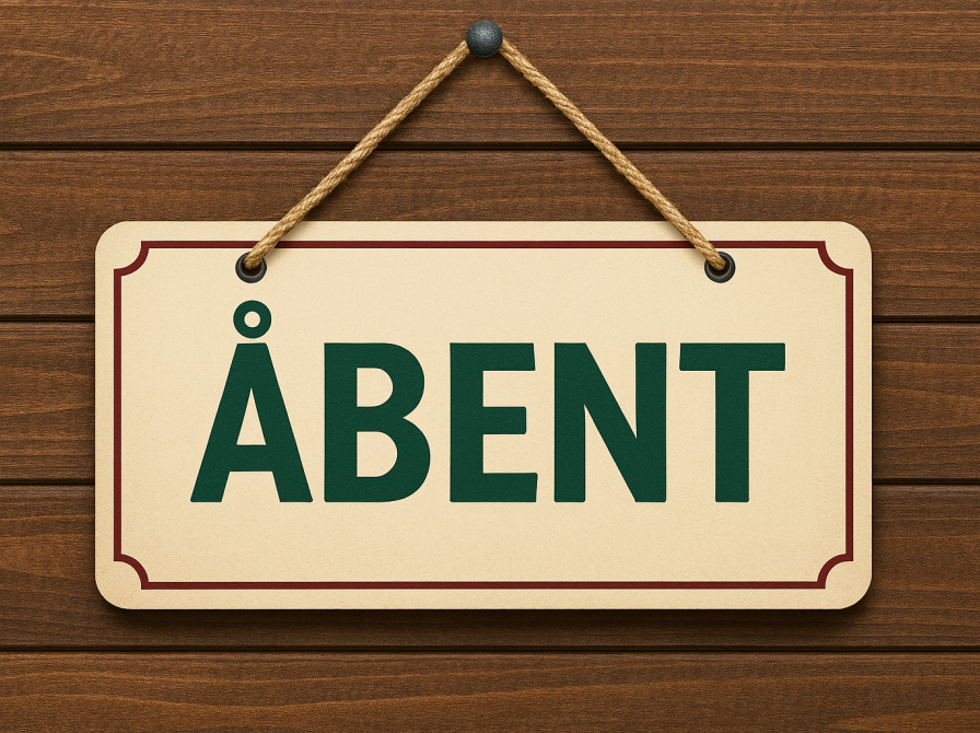 Skilt hvor der står åbent